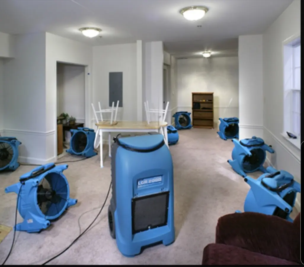 Air movers and dehumidifier setup for Water Damage Restoration in Lincoln